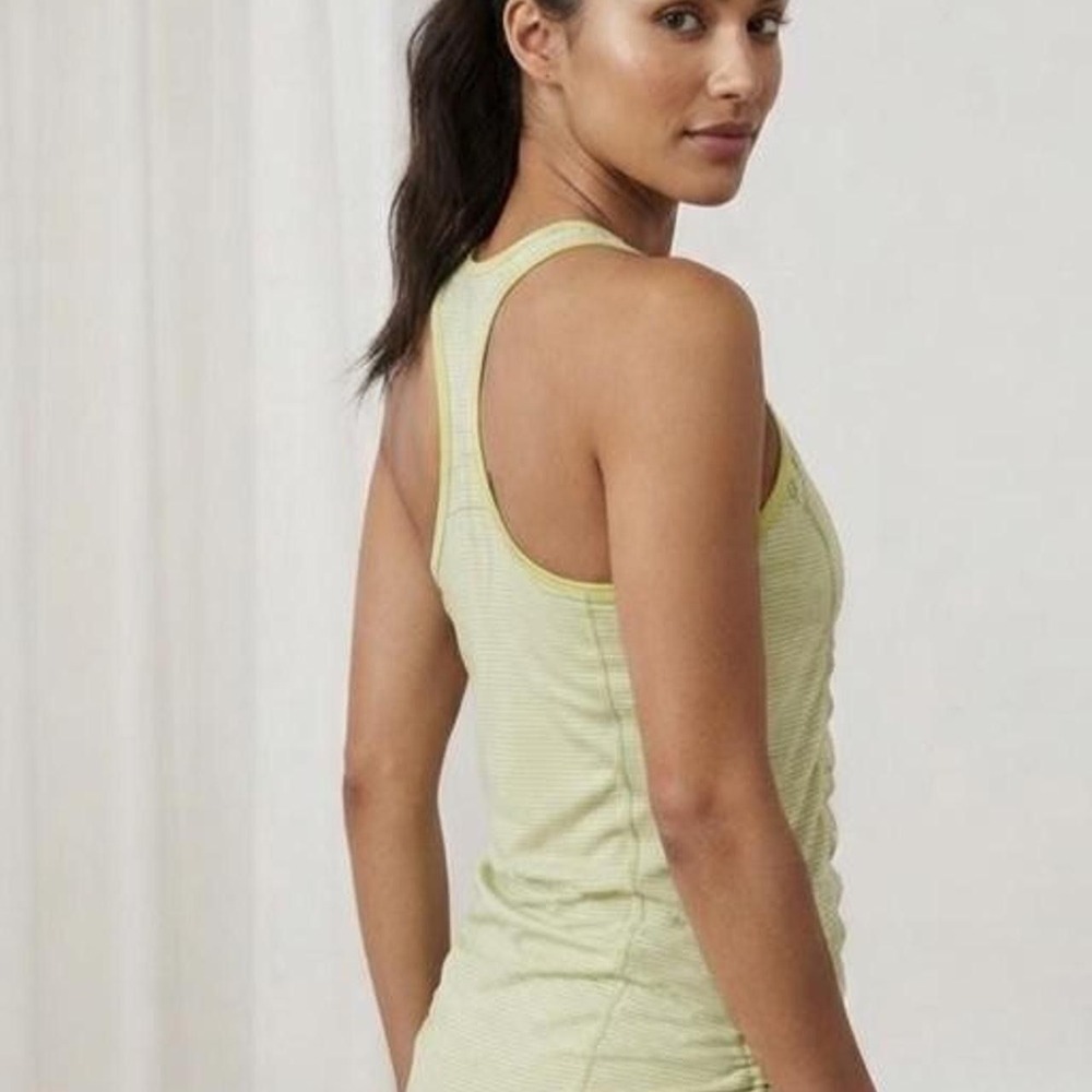 Lululemon light green/yellow tank top with thin white vertical stripes